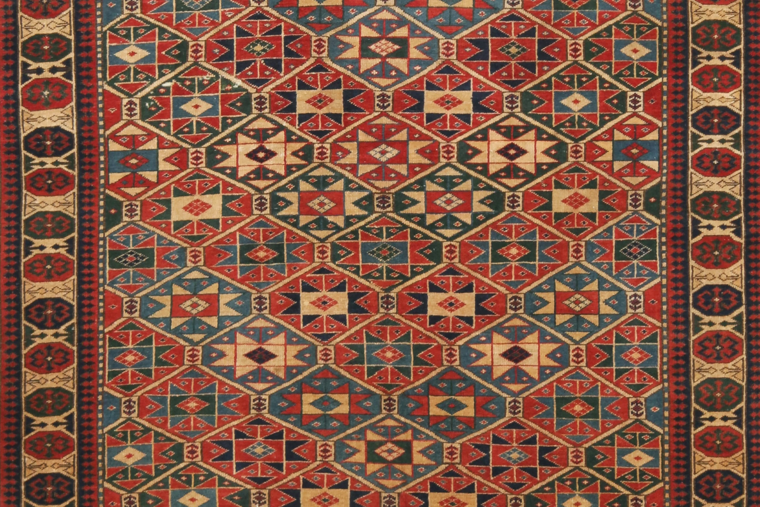Antique Kazak Geometric Rug