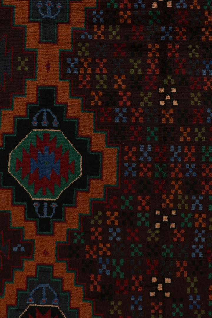 Vintage Baluch Tribal Rug with Colorful Geometric Patterns
