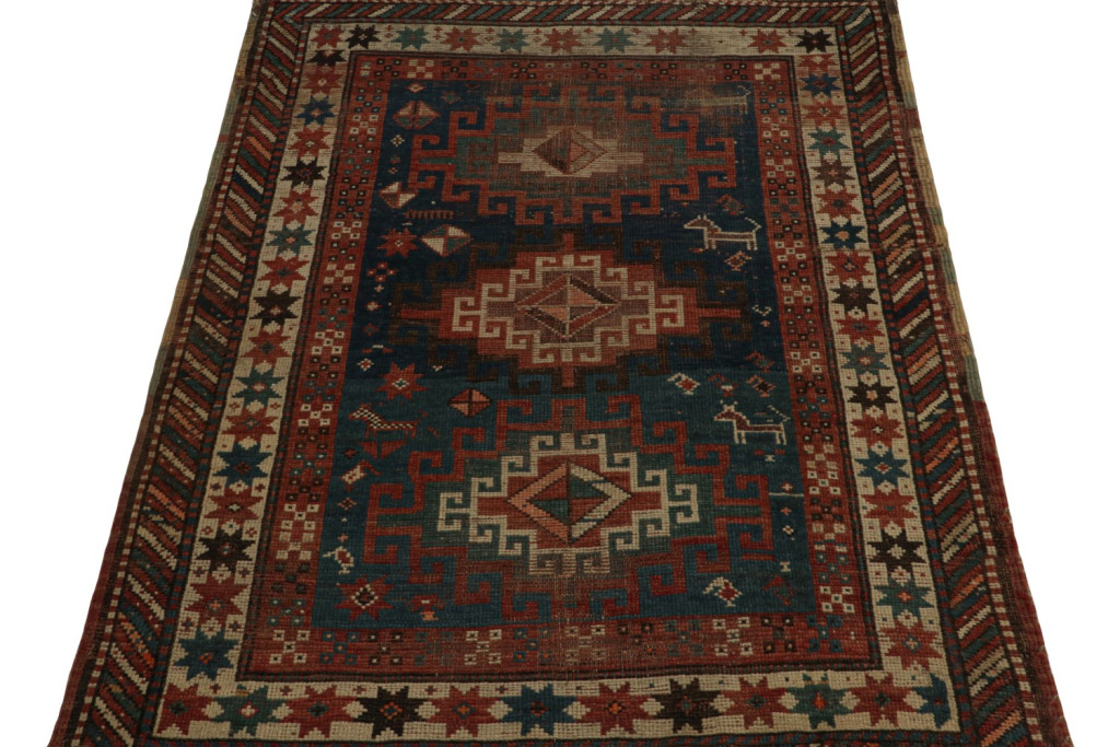 Antique Caucasian tribal rug