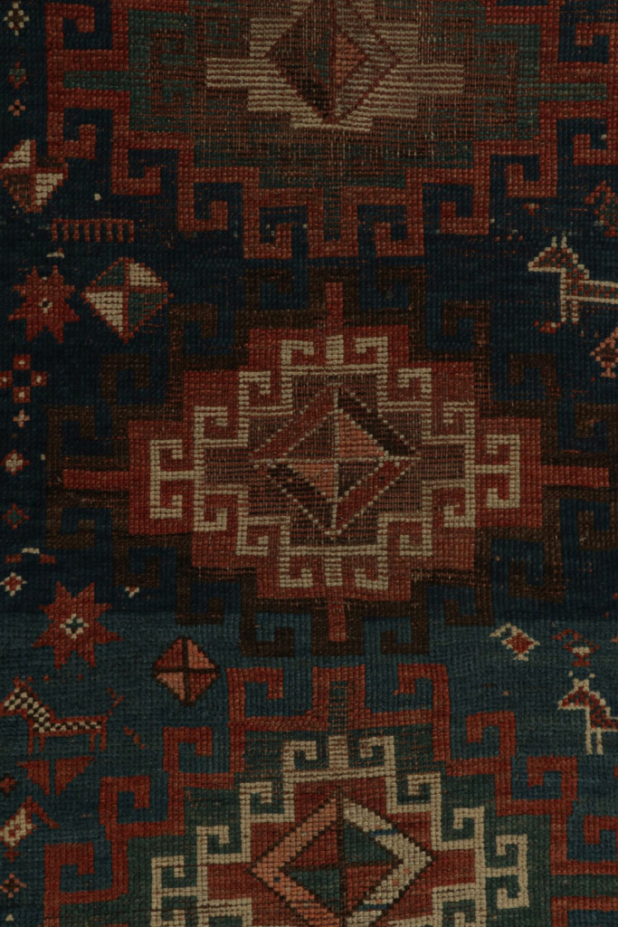 Antique Caucasian tribal rug