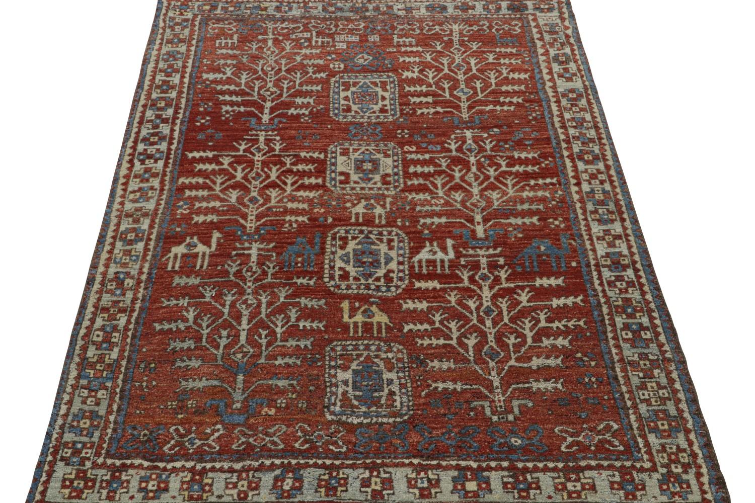 Red Tribal Rug with Camel Motifs
