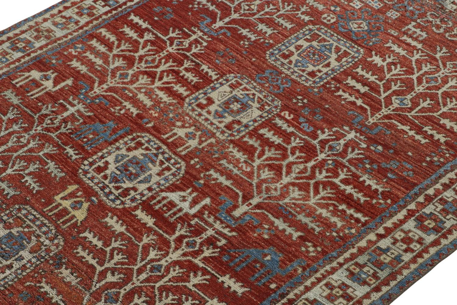 Red Tribal Rug with Camel Motifs