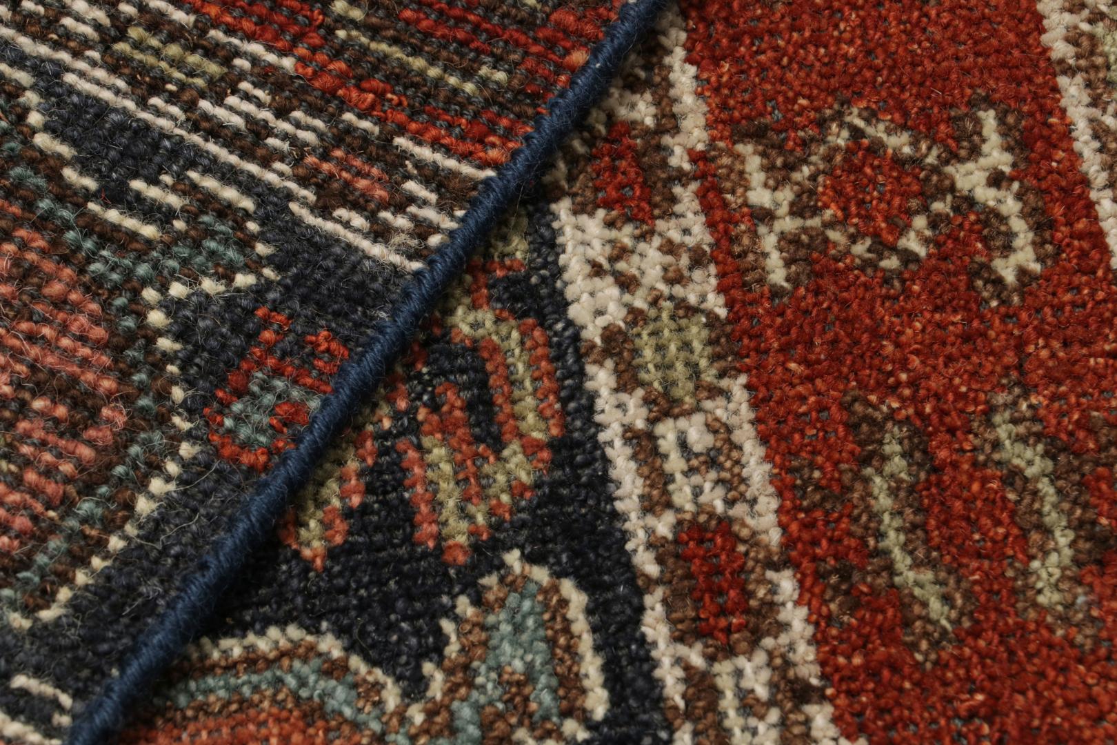 Tribal Rug with Primitivist Geometric Pattern