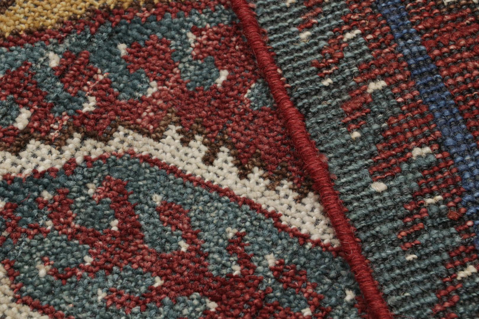 Tribal Rug with Primitivist Geometric Pattern
