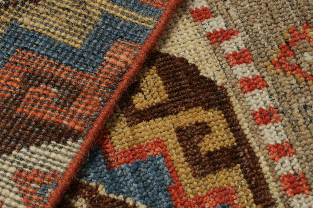 Tribal Rug with Primitivist Geometric Pattern