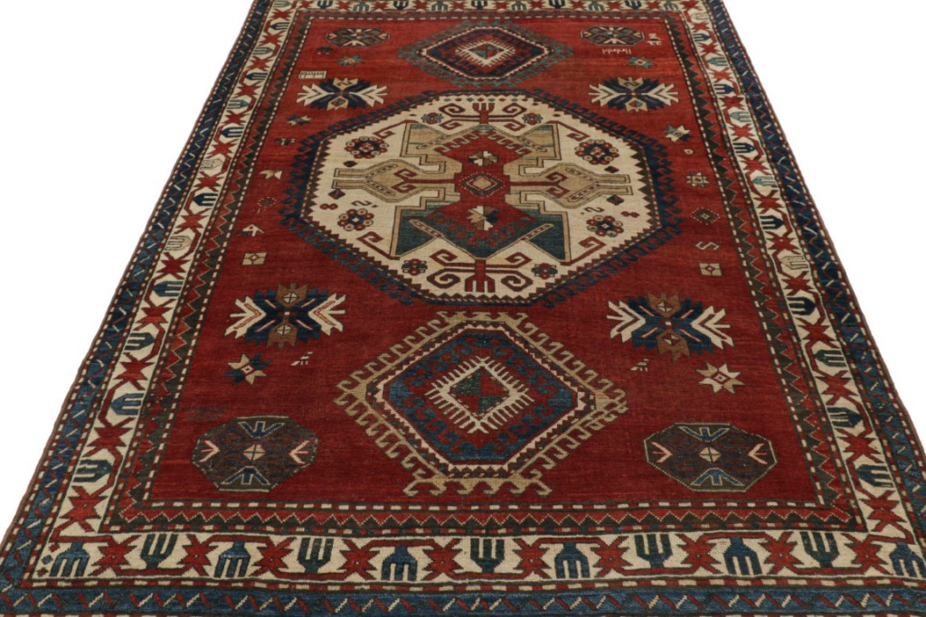 Antique Kazak Geometric Rug