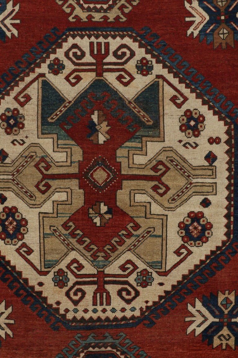 Antique Kazak Geometric Rug