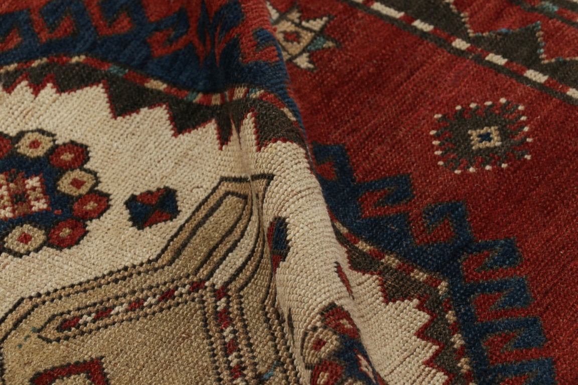 Antique Kazak Geometric Rug