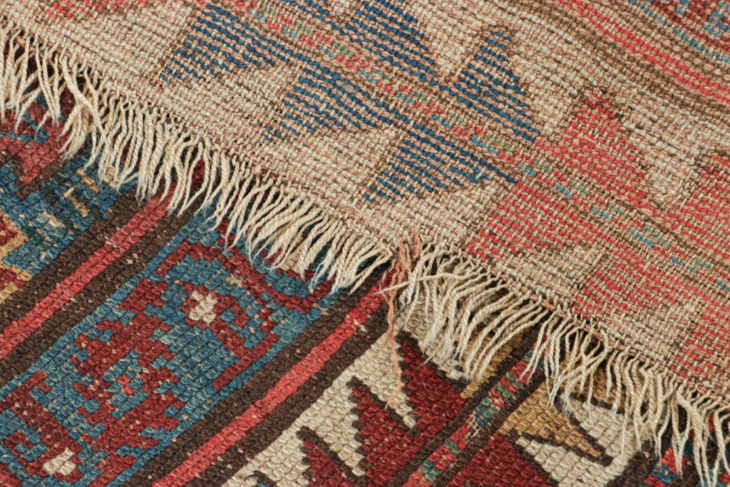 Antique Kazak Geometric Rug