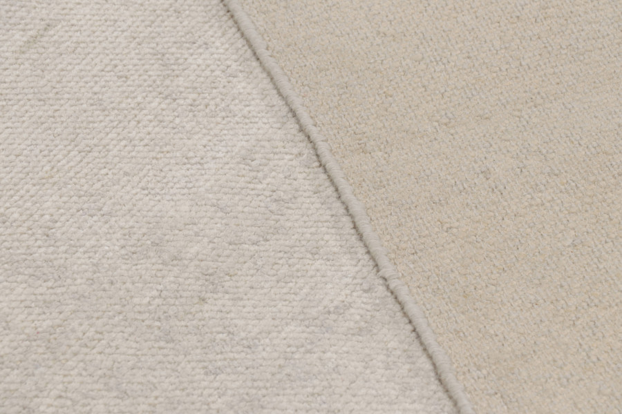 Rug & Kilim’s Oversized Contemporary Textural Solid Rug in Ivory Tones
