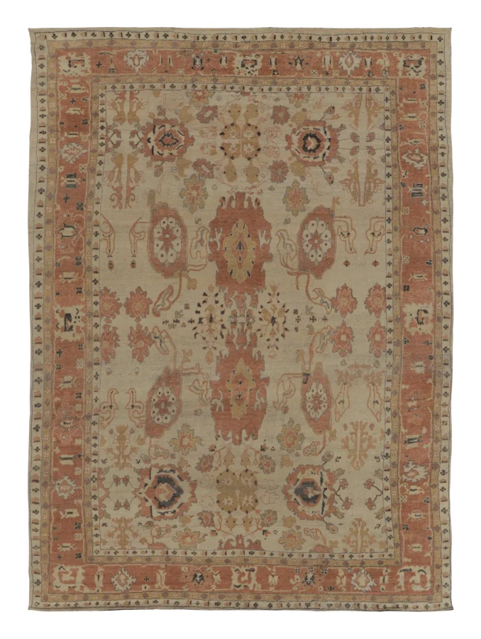 Rug & Kilim’s Oushak Rug in Creamy Beige with Rust Floral Patterns