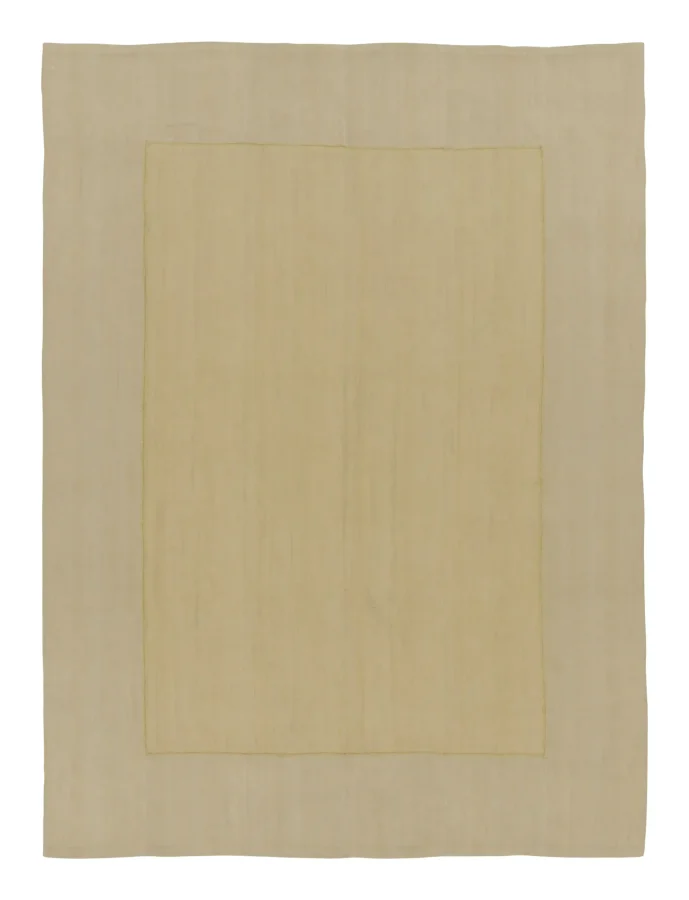 Rug & Kilim’s Contemporary Textural Solid Kilim in Beige and Gold Tones