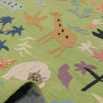 Rug & Kilim’s Suzani Kilim Runner, Vibrant Animal Pictorials in Green >>